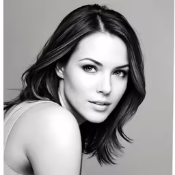 a black and white image of a woman