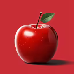 an apple with the leaf on it