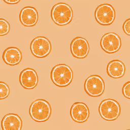 many orange slices are arranged in a large pattern