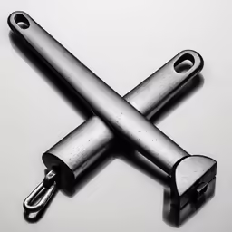 a group of three metal pieces on top of each other