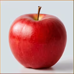 red apple with a leaf, taken on white background