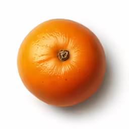 an orange is shown with drops of water