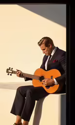 a man wearing a suit and tie playing an acoustic guitar
