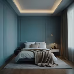 a white bed sitting in the middle of a room
