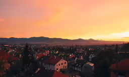 a dusk view from the roof of a home