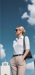 a woman is standing against the side of a building and wearing a shirt