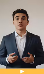 a man holding his hands in his pockets