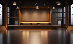 an empty stage with benches and large windows