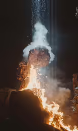 a big pile of fire on a black background