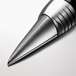 the top side of an office pen, which is pointed up