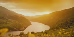 a view of the mountains surrounding a river