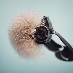a photographer lens with a bunch of fluffy things in it