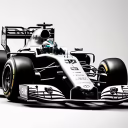 a black and white race car driving down the track
