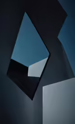 the mirror on top of the cabinet in front of a blue wall