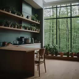 a kitchen with a window and a desk