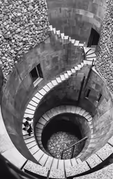 stairs leading up to the top of a tall tower