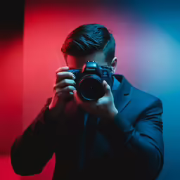a man is taking a picture with his camera