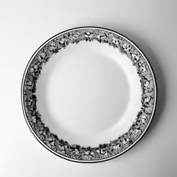 a white plate with an elegant floral design