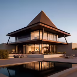a large building with a pool next to it