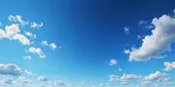 the sky is full of clouds in this sunny day