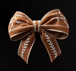 a brown and white bow is tied to a string