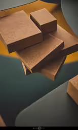 three brown pieces of cardboard sitting on top of each other