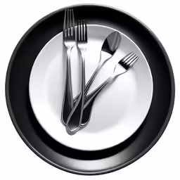 two forks, a spoon and some knives in a plate