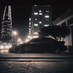 car parked on the side of the road at night