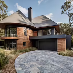 this modern house is made of wood and has round shapes
