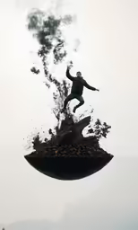 a man is standing on top of something in the air