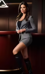 the beautiful woman is posing for the camera