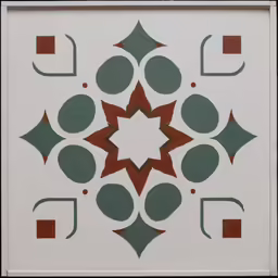 an artistic tile design in white and green with red accents