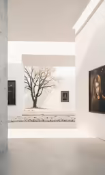 a white building with paintings and a tree in the corner