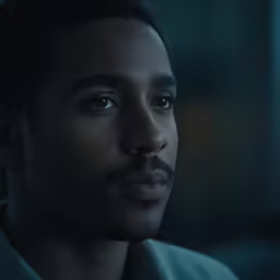 a close up of a person with a mustache