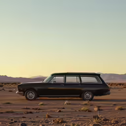 a vintage station wagon in the desert on a clear day