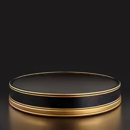 round black and gold platter with a black base