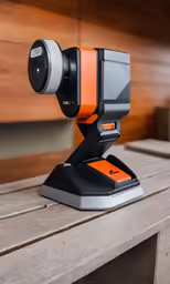 the webcam sits atop a table with a built in camera attached