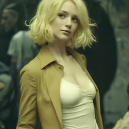 a woman is standing next to a man in a suit