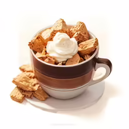 a cup with a bowl of cookies, cheese and cream