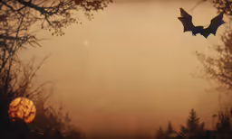 a flying bat over trees in the early evening