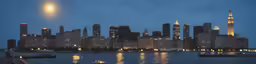 a night time cityscape with the lights on