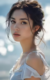 woman with short hair and blue eyes on beach