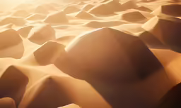 the sun shines on sand and rocks