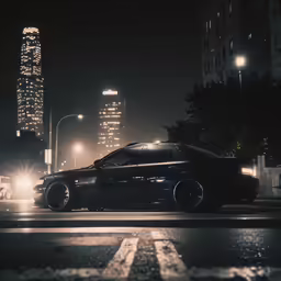 a car parked on the street in the city at night
