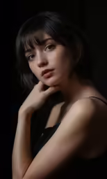 an attractive young woman is posed for the camera