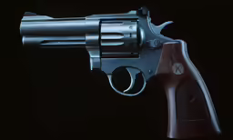a revolver is on a black background