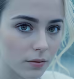 the girl with blue eyes has blonde hair