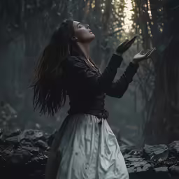 a woman in a dress standing on rocks near water