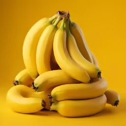 there are many bananas stacked up together