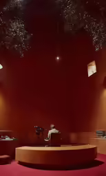 an empty stage with a red floor is lit by a light fixture